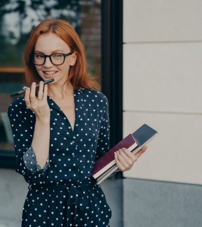 beautiful-smiling-business-woman-using-speakerphone-or-virtual-voice-assistant-on-mobile-phone.jpg bookkeeping for business